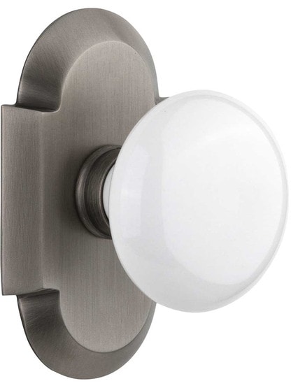 Arched Rosette Door Set with White Porcelain Knobs in Antique Pewter.